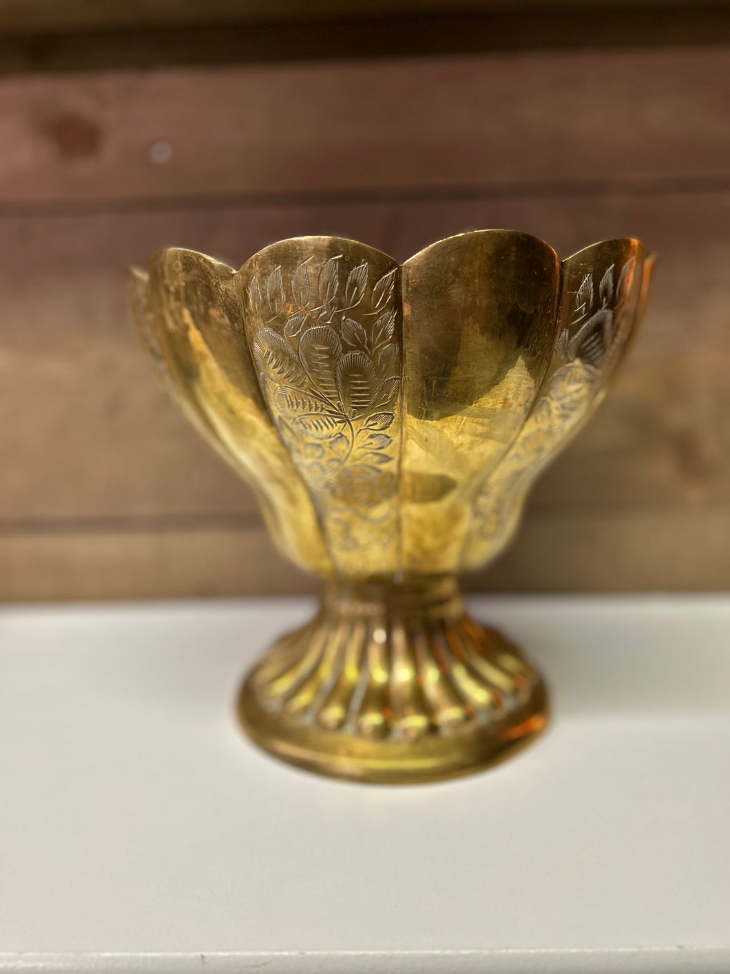 Large brass edged pedestal bowl