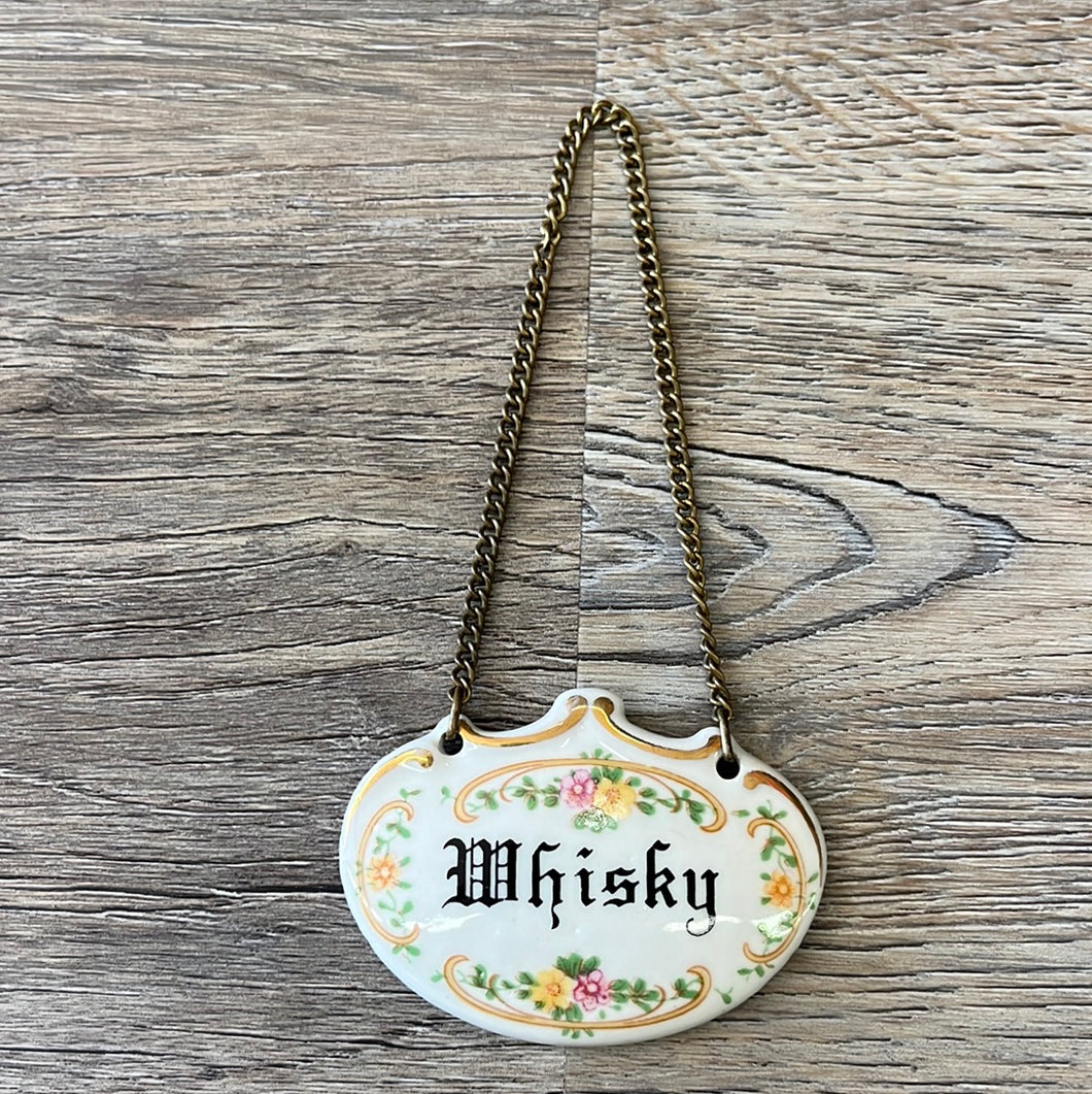 Vintage, ceramic liquor tag