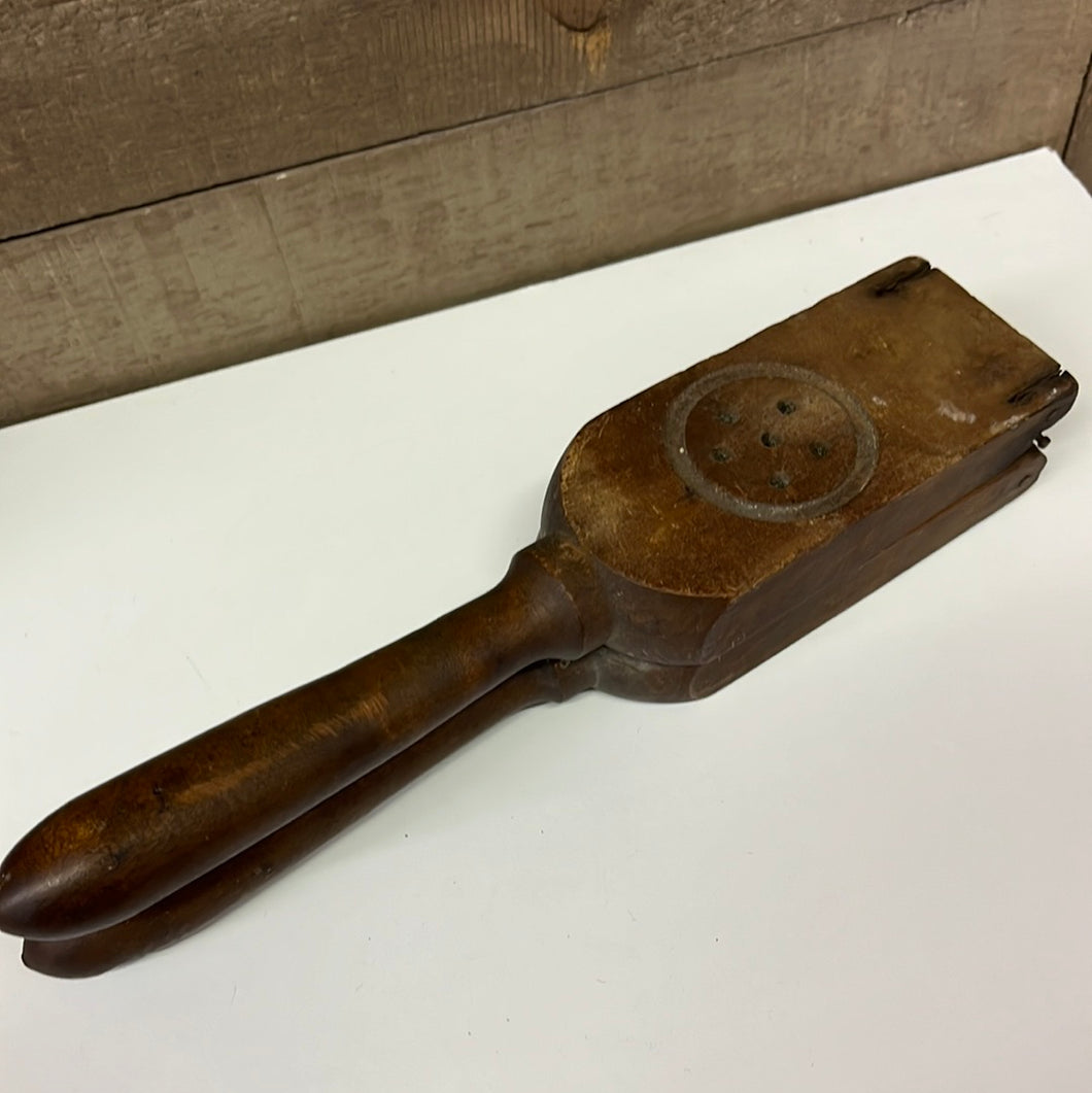 Antique wood lemon press