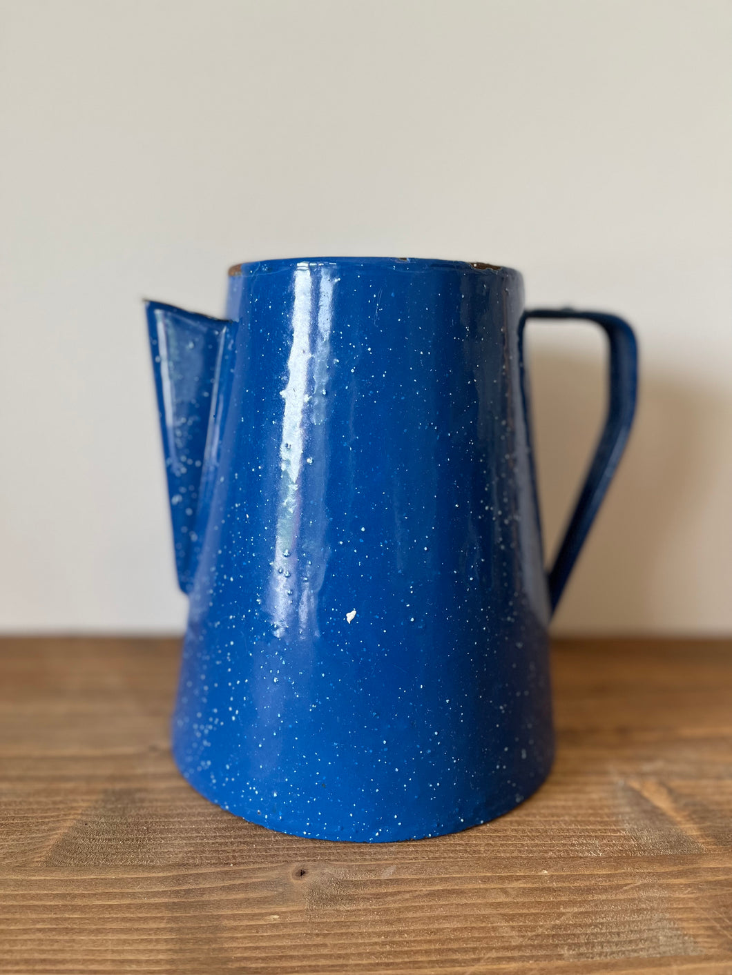 Blue enamelware jug